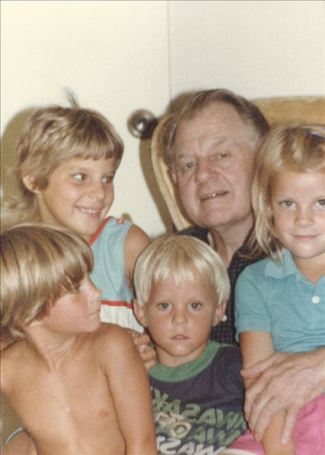 George A. Baker, 1985 w/ four fair headed grandchildren, Gus, Katie, David, and Julianne.