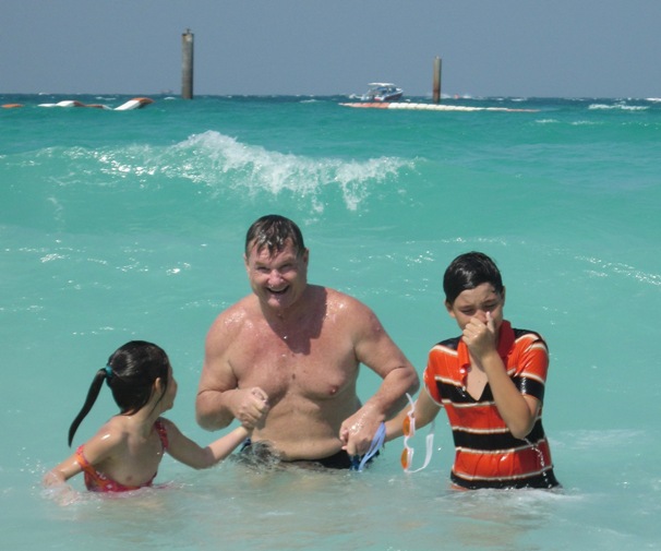 Having fun fighting the waves at Koh Larn Beach, Thailand 2012